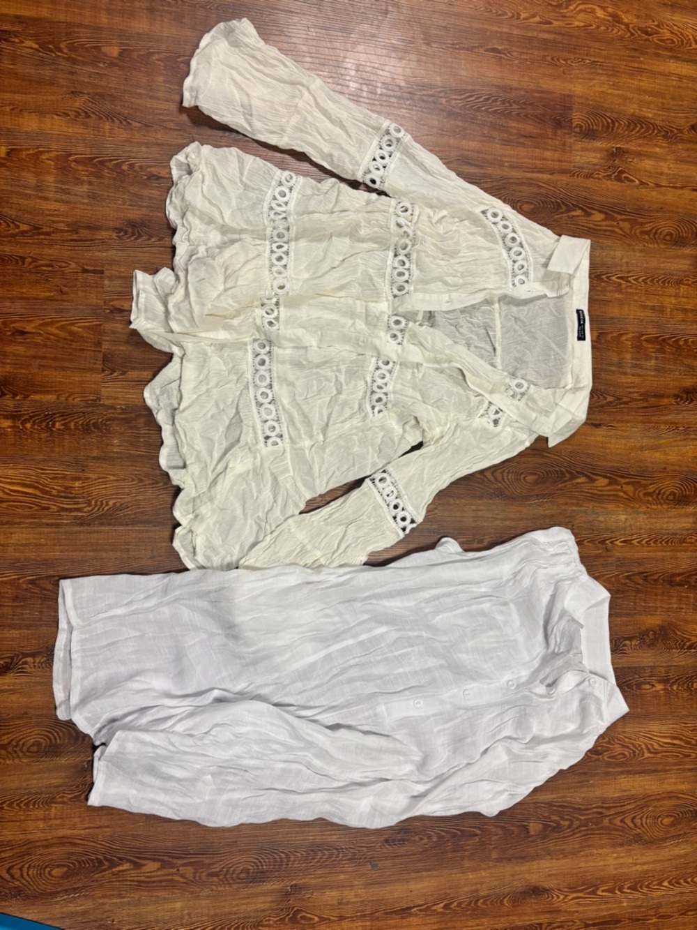 White coverups. One sleeveless, one with long sleeves.